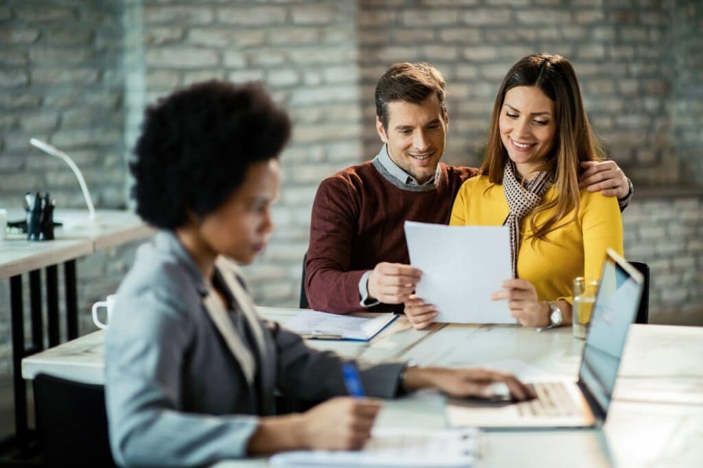 couple discussing prequalification vs preapproval for mortgage