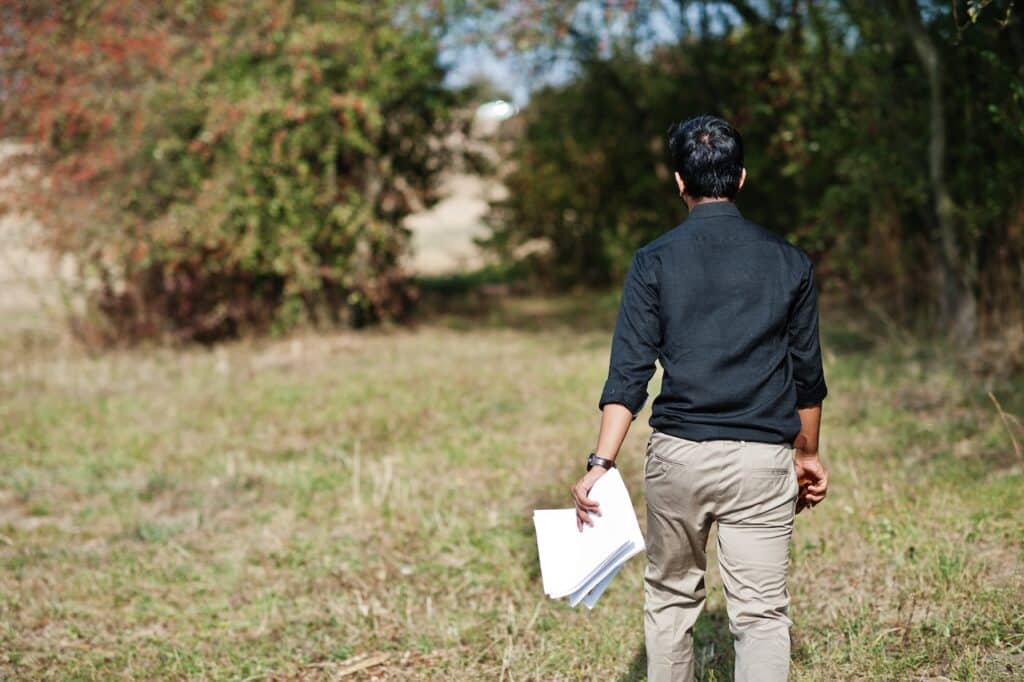 man investigating types of easements on property